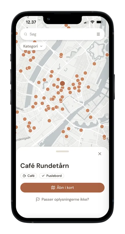 Skærmbillede af Tiny Guide-appen med Café Rundetårn, en café med puslebord